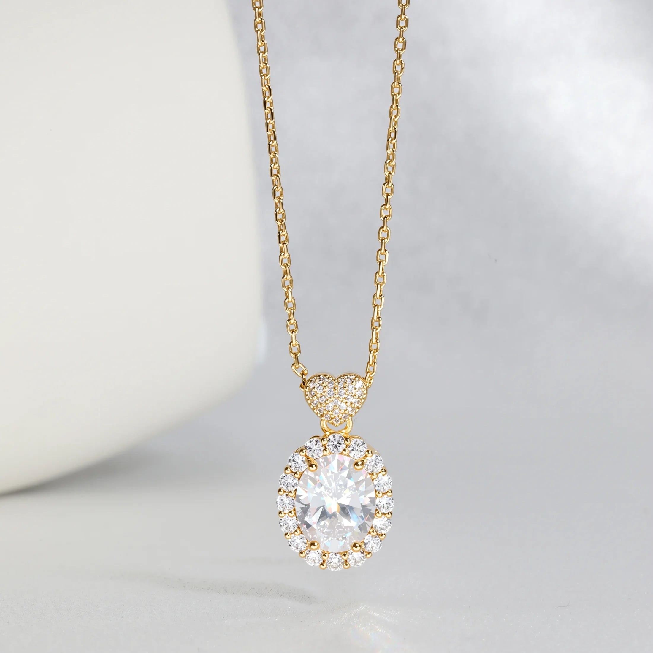 MENGLISI Clear Cubic Zirconia Oval Halo Pendant Necklace for Women, 14K Gold Plated Copper