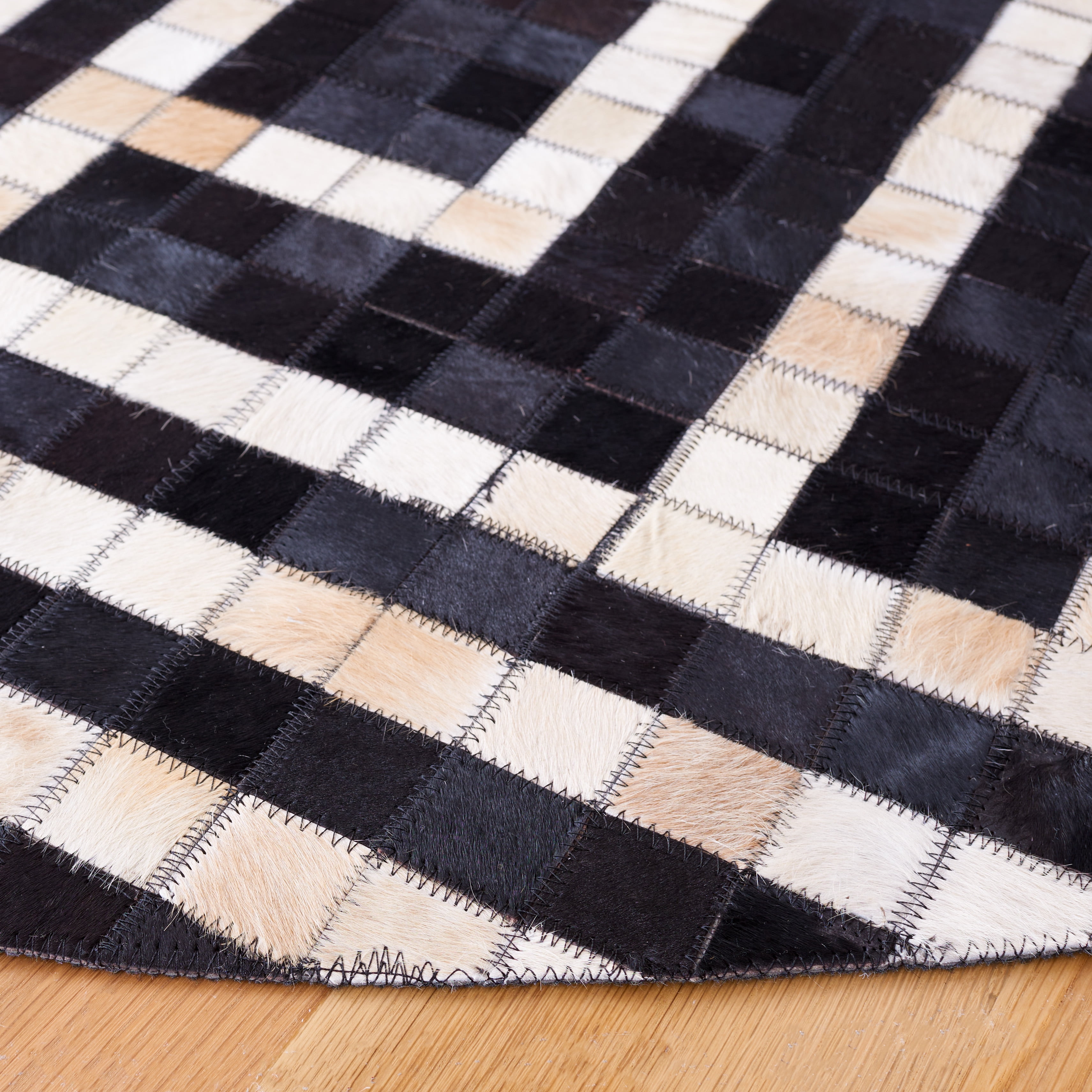 SAFAVIEH Studio Leather Ronnette Geometric Area Rug, Black/Ivory, 6' x 6' Round