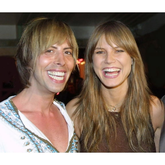 March cover girl Heidi Klum (r) arrives at Crobar with Steven Cojocaru (l) for Ocean Drive Magazine's March, 2002 issue release party. Miami Beach, FL 3-9-2002. Photo by Adam Scull
