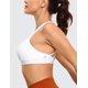 thumbnail image 3 of Sostén Deportivo CRZ YOGA con Tirantes Cruzados, Escote en V, Sin Aros, Blanco XL, 3 of 5