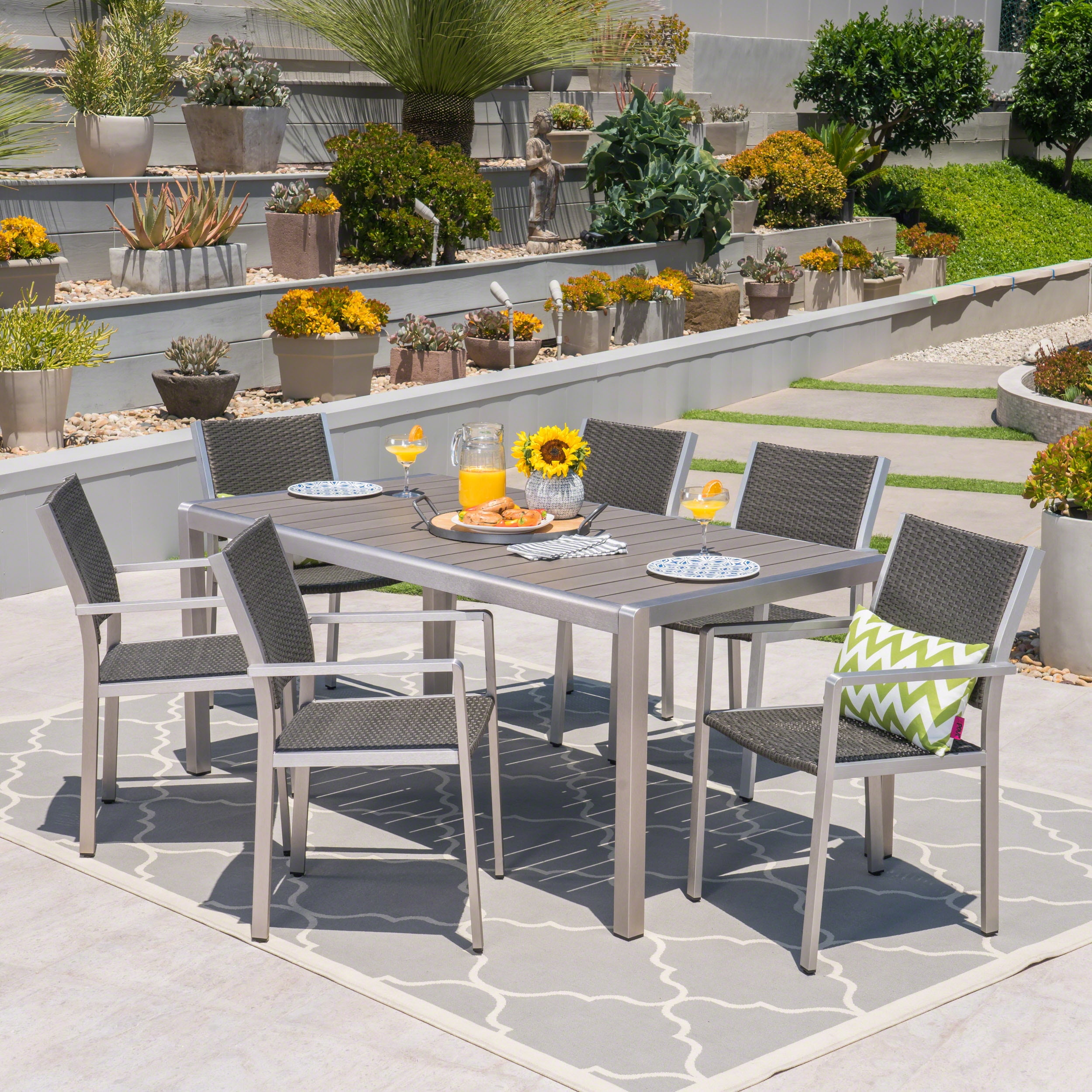 Gannon Outdoor 7 Piece Aluminum And Wicker Dining Set With Faux Wood
