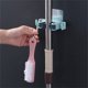 thumbnail image 5 of Estante de escoba para fregona montado en la pared, autoadhesivo, sin taladro, soporte de almacenamiento, baño doméstico, organizador de sala de lavado con 2 ganchos, azul claro Inevent HA011955-04, 5 of 6