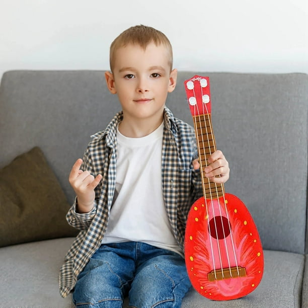 Guitarra infantil tipo ukelele de 14 pulgadas con 4 cuerdas, ideal para principiantes. Perfecto para que los niños desarrollen sus habilidades musicales y aprendan jugando. Ideal para niños en edad pr