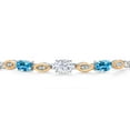 thumbnail image 3 of Gem Stone King 925 Silver and 10K Yellow Gold White Moissanite and Swiss Blue Topaz and Lab Grown Diamond Bracelet for Women | 2.06 Cttw | Gemstone | Oval 7X5MM | Fully Adjustable 9", 3 of 5
