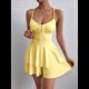 thumbnail image 4 of Vestido Mini de Fiesta Corto con Tirantes Finos y Lazo en la Espalda para Mujer, con Volantes Escalonados, Corte en A, y Ajustado. Amarillo XS, 4 of 8