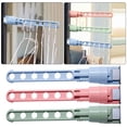 thumbnail image 1 of Fiudx Percha Portátil, Diseño Sin Perforaciones de 8 Agujeros, Plástico Duradero, Longitud Ajustable, Fácil Instalación con Rosca, Ideal para Interiores y Viajes, 31,5 X 5 Cm., 1 of 2