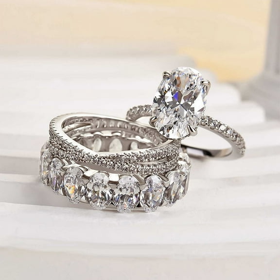 Eloya Jewel Trio Engagement Ring Set - 1.4 Ct Oval Cut Lab Created Diamond with Criss Cross Band in 14K White Gold Plated - Bridal Wedding Ring