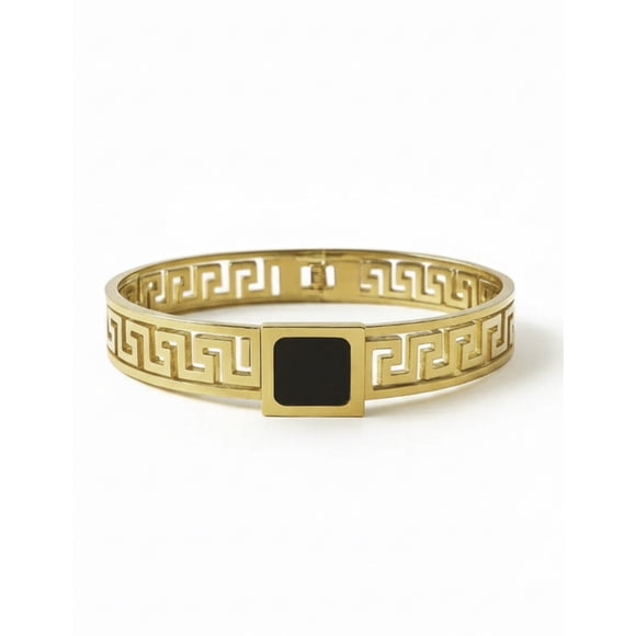 Brazalete rígido de oro laminado con diseño de grecas