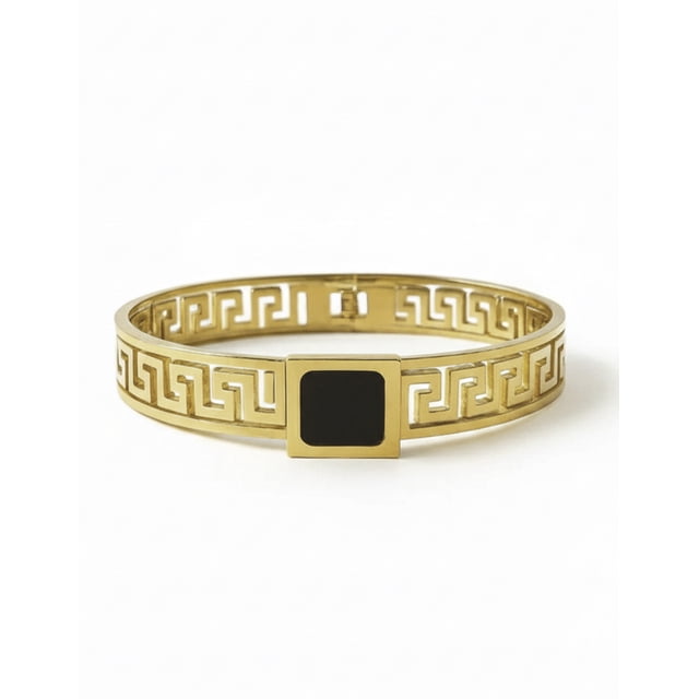 Brazalete rígido de oro laminado con diseño de grecas