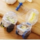 thumbnail image 1 of Cortador de ajo con rodillo, paquete aleatorio de 2 unidades, mini trituradora de ajo manual, machacador de ajo rápido, molinillo de ajo, machacador de ajo, herramientas de cocina, 1 of 2