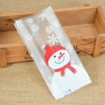 thumbnail image 2 of 25/50 Uds. Bolsas de regalo de plástico con bonitos muñecos de nieve, bolsa de embalaje para hornear galletas y dulces, regalos de decoración para fiestas de Navidad, Año Nuevo e Invierno, 2 of 5