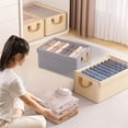 thumbnail image 1 of Fiudx Cesta de Tela Plegable con Tapa, 22 L, Color Beige y Gris, Ideal para Guardar Ropa Interior y Artículos de Primera Necesidad, 40 X 27 X 21 Cm., 1 of 7