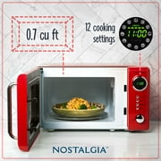 Nostalgia 0.7 cu ft Retro Microwave Oven, 700W Countertop Microwave Oven with Digital Clock, Red