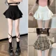 thumbnail image 2 of Falda negra 2024 Nueva temporada de primavera Falda mini de mujer Falda acampanada adelgazante de cintura alta Falda pantalón con volantes, 2 of 4