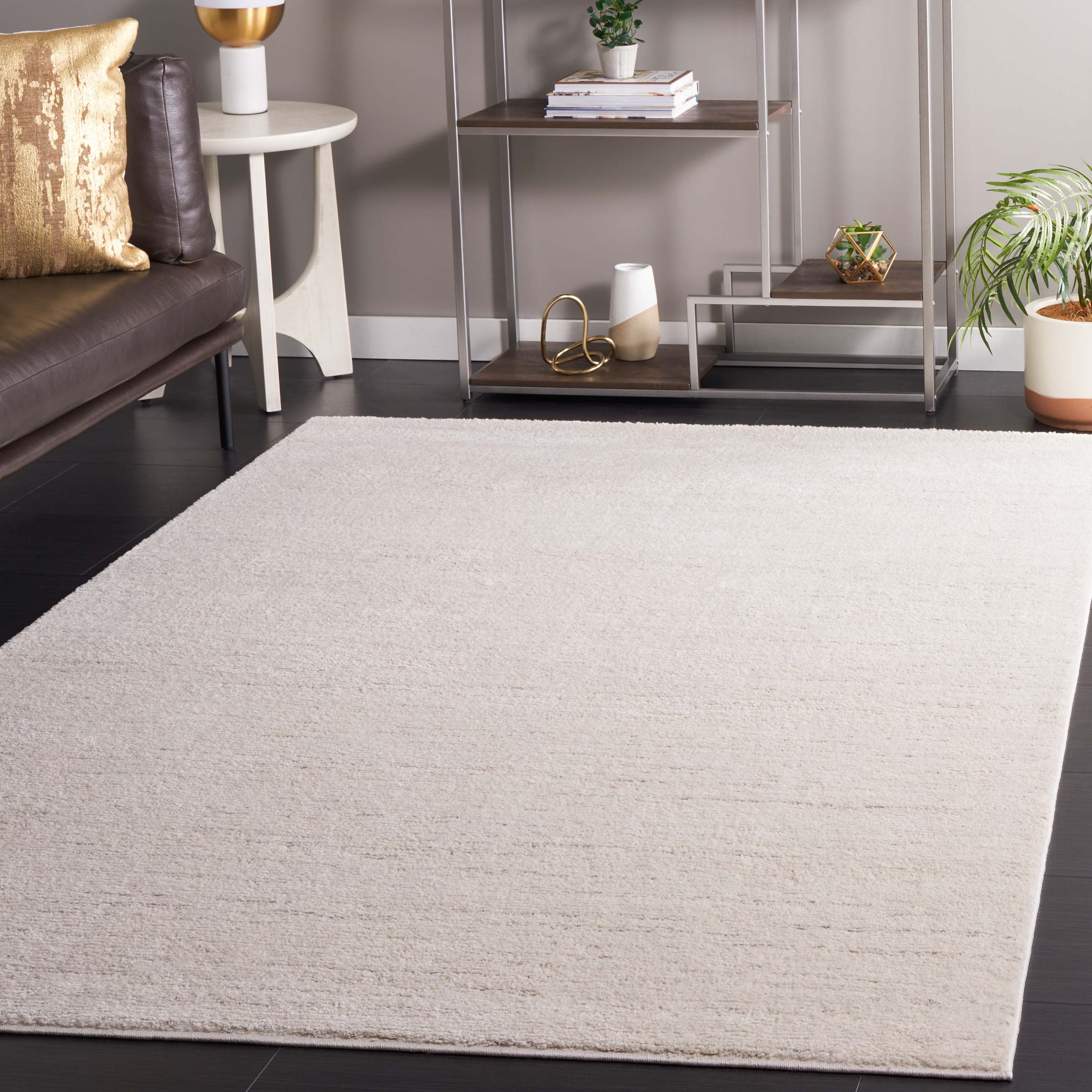 SAFAVIEH Revive Aleah Solid Polyester Area Rug, Ivory, 8' x 10'