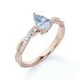 thumbnail image 4 of JeenMata 1 Carat Pear Shaped Created Aquamarine Eternity Ring in 18k Rose Gold over Silver, 4 of 6