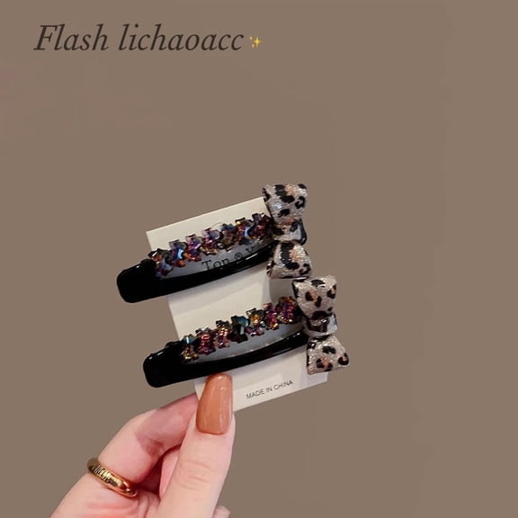 Korean-style Dongdaemun fashion leopard print bow hair clip with rhinestone edges, women's high-end bangs and flyaway hair barrette