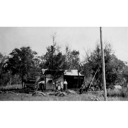 - LAMINATED POSTER Family group in front of their home in the bush, ca. 1916 Family members pose in front of their bush Poster Print 24 x 36