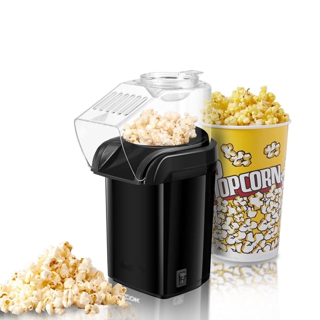 Home electric popcorn maker with measuring cup for portioning kernels and melting butter