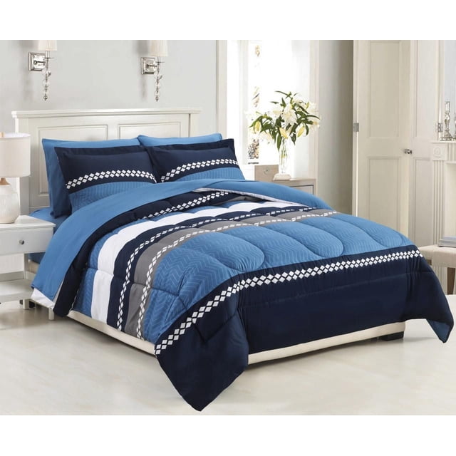 Navy blue geometric striped comforter set with matching pillowcases on bed in modern bedroom setting.