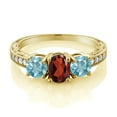 thumbnail image 2 of Gem Stone King 2.69 Ct Oval Red Garnet Blue Zircon 18K Yellow Gold Plated Silver Moissanite Ring (Size 9), 2 of 4