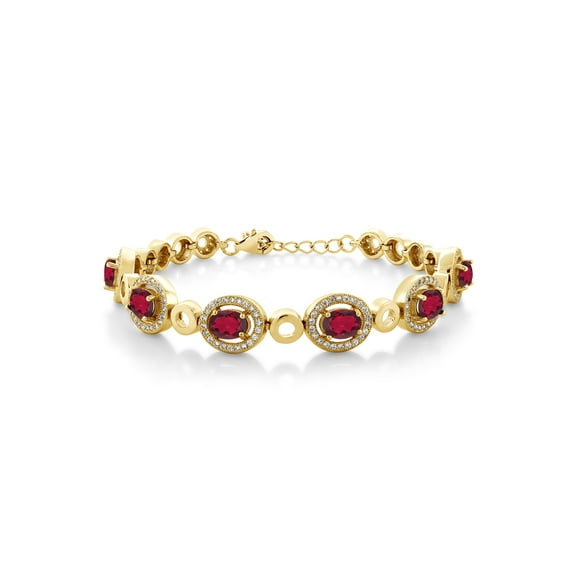 Gem Stone King 18K Yellow Gold Plated Silver Ruby Red Mystic Topaz Tennis Bracelet for Women (6.72 Cttw, Oval 7X5MM, 7 inch with 1 inch Extender)