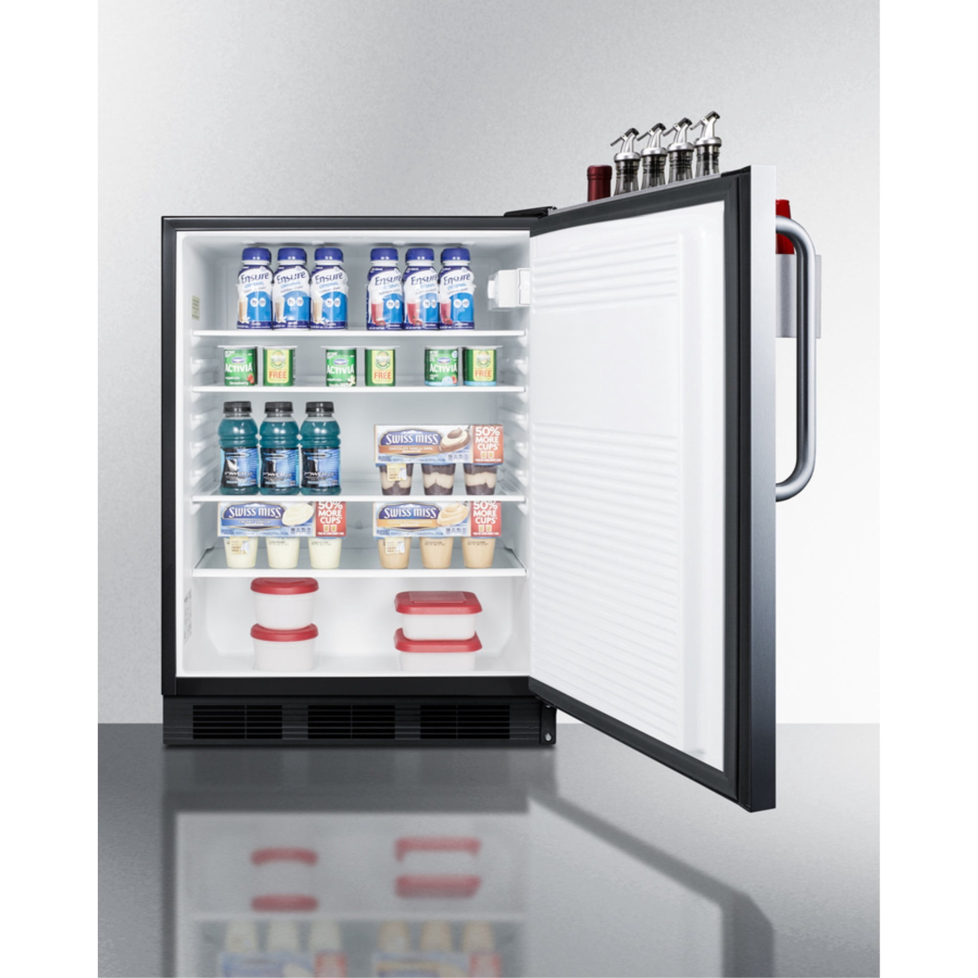 Commercially listed all-refrigerator with stainless steel door, removable speed rail, towel bar handle, and automatic defrost