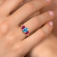 thumbnail image 4 of Gem Stone King 18K Rose Gold Plated Silver Swiss Blue Topaz and Red Created Ruby Filigree Style 3 Stone Ring for Women (2.50 Cttw, Oval 8X6MM and 6X4MM) (Size 8), 4 of 6