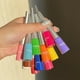 thumbnail image 2 of Lápiz delineador líquido CMAADU en colores vibrantes, ideal para looks de escenario, resistente al agua y sin manchas, disponible en tonos blanco, amarillo, morado y negro. Perfecto para eventos, 2 of 6