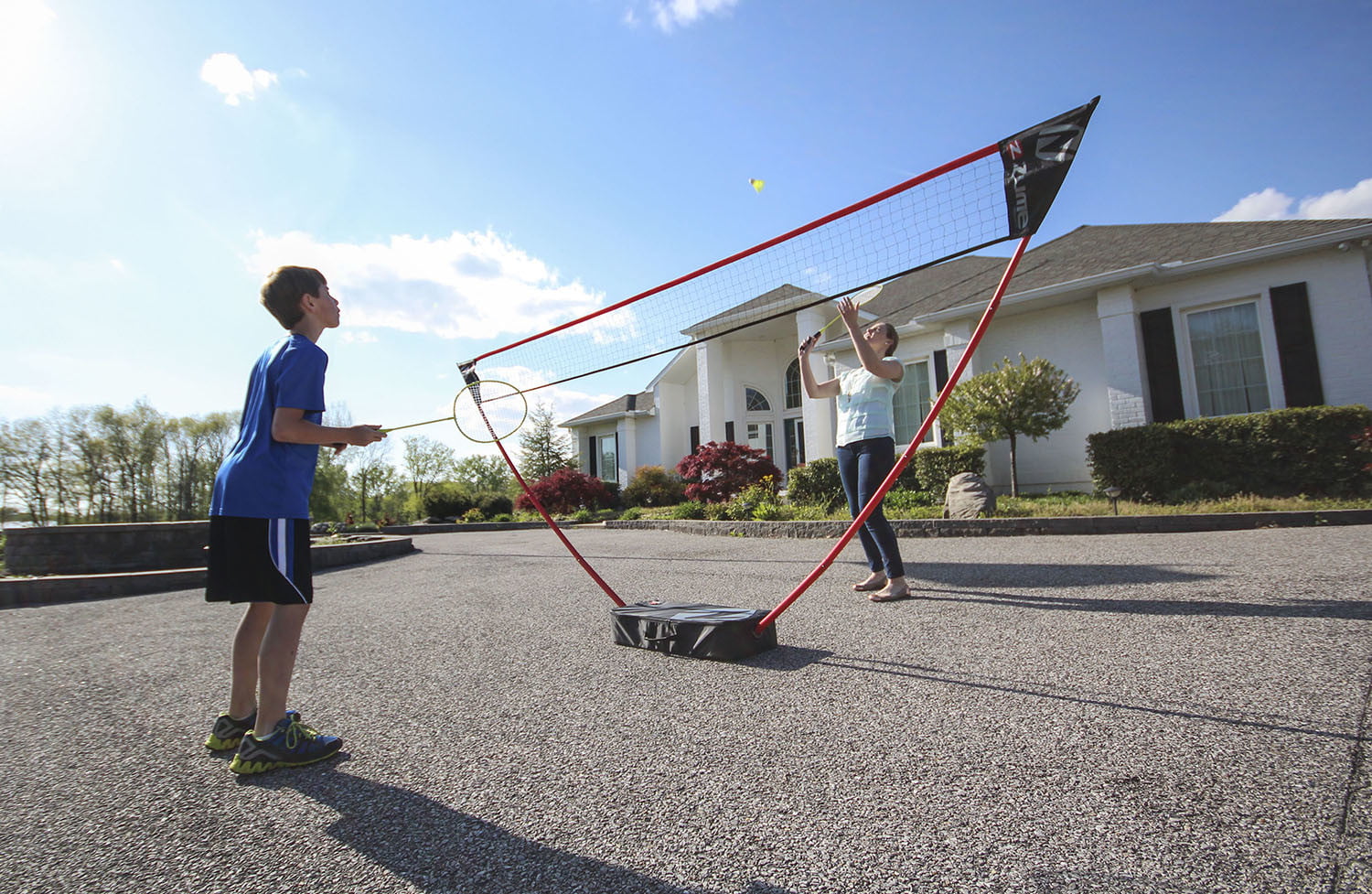 Zume Games Portable Badminton Set with Freestanding Base No Tools or Stakes Required Sets Up on Any Surface in Seconds 