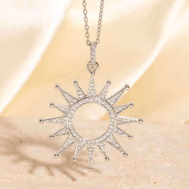 Colgante de zircon ligeramente incrustado en el sol collar dorado de cobre de alta gama de moda joyas de diseño de nicho creativo femenino