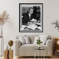 thumbnail image 4 of Historic Framed Print, [Lester Pearson, half-length portrait, seated at desk, facing slightly right, holding up radiogram], 17-7/8" x 21-7/8", 4 of 9