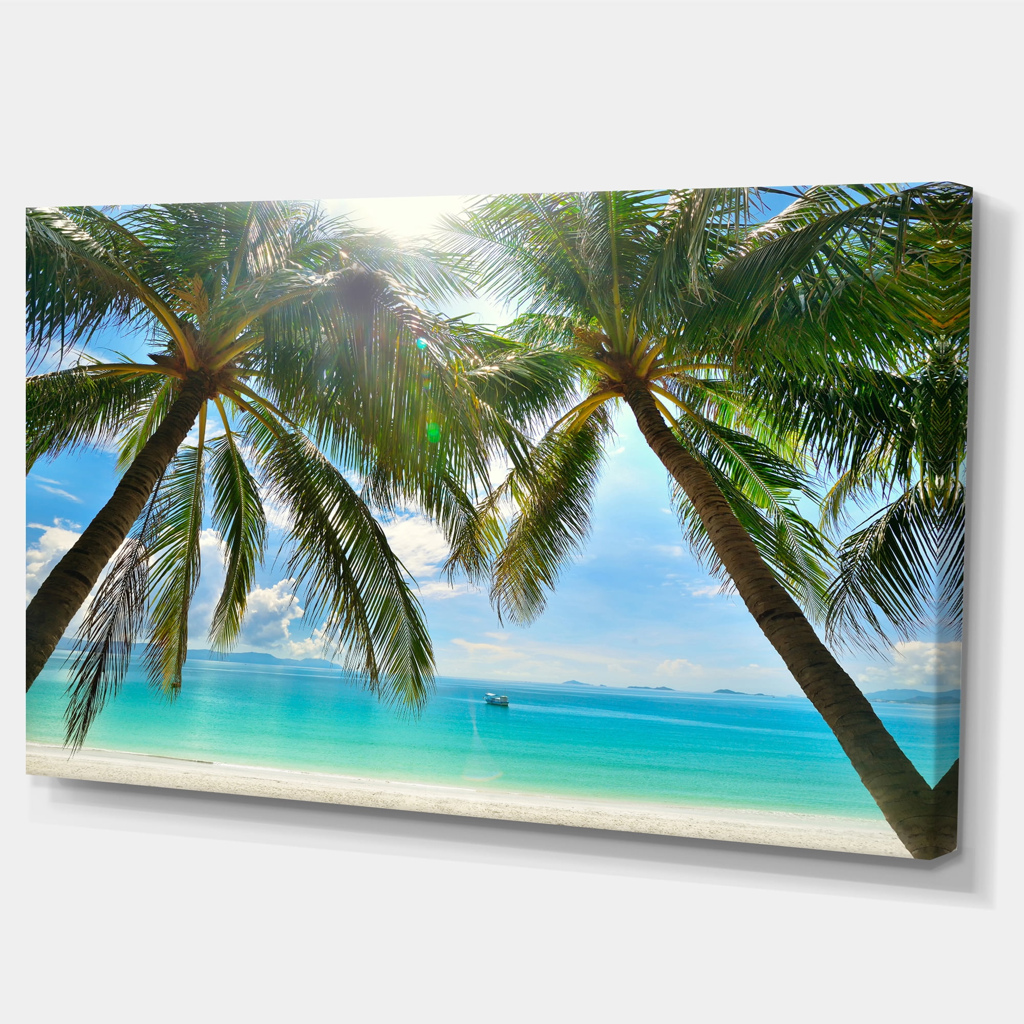 Designart 'Palm Hanging over Sandy White Beach ' Seashore Photo Canvas Art Print