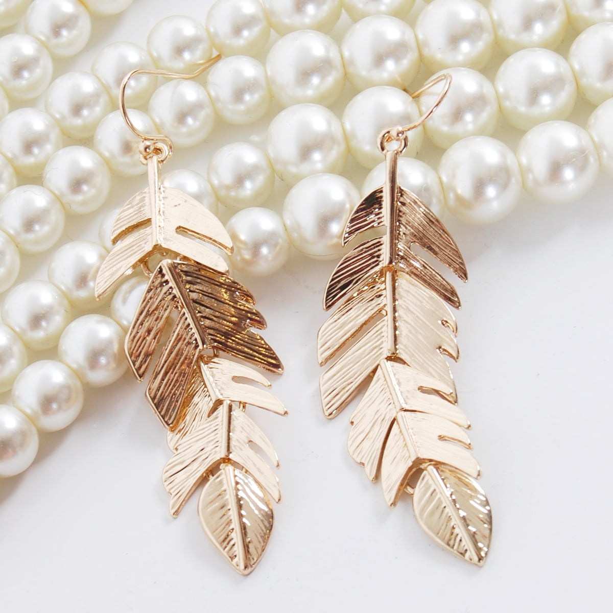 Floating Feathers Dangle Earrings - Long Hanging Metal Link Leaf Drops by  Humble Chic NY, Gold-Tone 