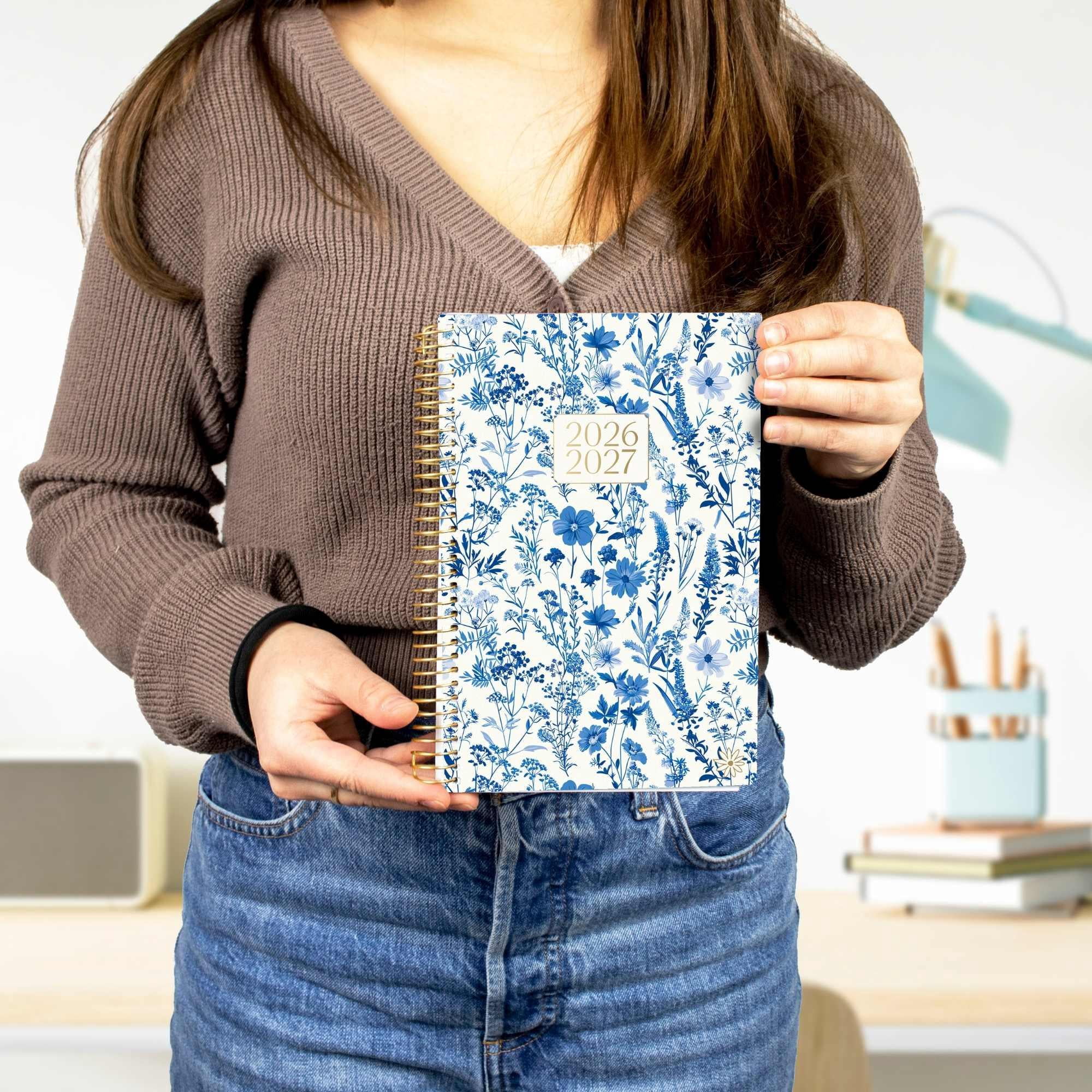 bloom daily planners 2026-2027 Academic Planner, 13 Month Monthly & Weekly Soft Cover, 5.5" x 8.25", Stickers Included, Blue & White Floral