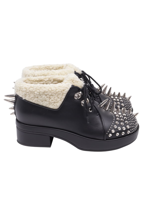 Pre-Owned Gucci Harlem Spike Shear-Lined Ankle Boots in Black Leather