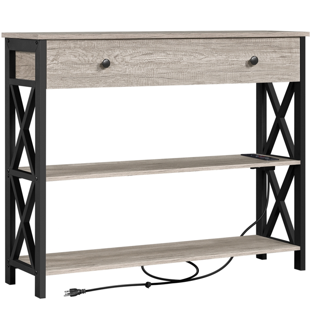 Vintage gray wooden console table featuring a black metal frame with X-shaped sides, one drawer for storage, two open shelves below, and an integrated power outlet with attached cord.