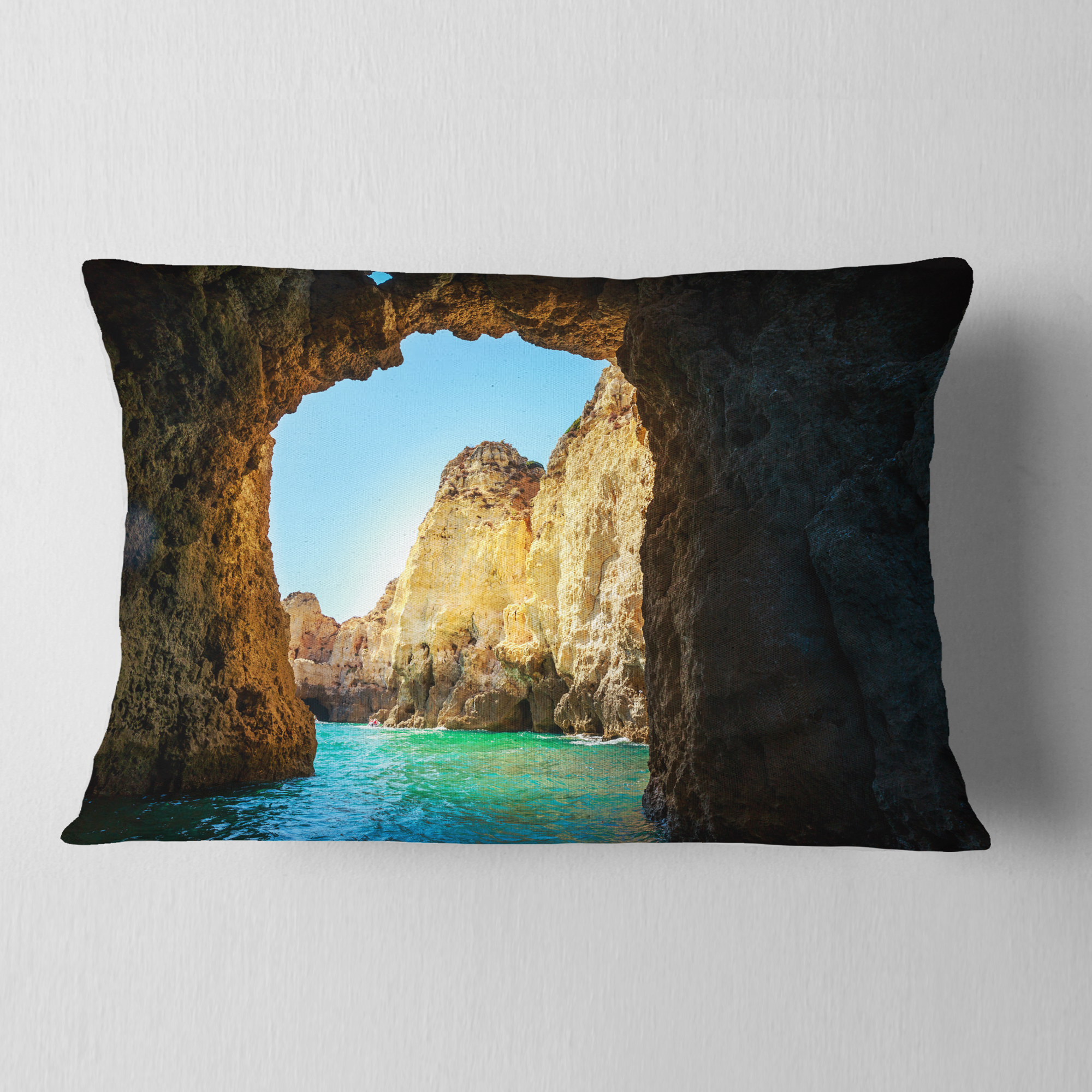 Designart Sea through Rocky Cave Portugal - Seashore Throw Pillow - 12x20