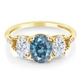 thumbnail image 2 of Gem Stone King 10K Yellow Gold Persian Blue Moissanite and White Moissanite and White Diamond 3-Stone Engagement Ring for Women (2.42 Cttw, Oval 8X6MM and 6X4MM, Gemstone Birthstone, Size 6), 2 of 4