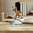 thumbnail image 5 of Rotating acrylic piece featuring a full-body praying angel with stained glass design in simple lines and photorealistic details against a white background, 5 of 7