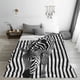 thumbnail image 5 of Fotbe Optical Zebra Illusion Manta de Franela Acolchonada con Estampado, Súper Suave y Esponjosa, Extra Grande para Sofá, Cama, Uso Todo el Año-50"x40", 5 of 7