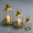 Antique Gold-Set of 2 15.7" 12", variant on Decorative Metal Lanterns Black Set of 3 20" 15.7" 12" Indoor Outdoor Candle Holder