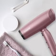 thumbnail image 5 of Secador de pelo Conair con difusor y mango plegable, ideal para viajes, Radiance Boost para un cabello con menos frizz, más brillo y sedosidad irresistible. Incluye difusor y concentrador., 5 of 5