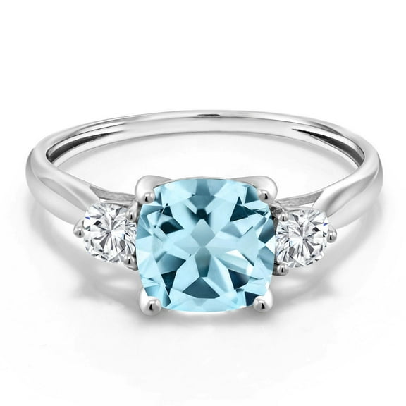 Gem Stone King 10K White Gold Sky Blue Topaz and White Moissanite 3 Stone Engagement Ring for Women (2.26 Cttw, Cushion 7MM, Gemstone November Birthstone, Size 5)