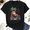 Black, variant on Unisex Christmas in July Santa T-Shirt, Surf Lounge Graphic, 100% Cotton Short Sleeve Tee