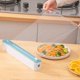 thumbnail image 2 of Reusable and magnetic plastic film dispenser, refillable, with film cutter, magnetic strip, white and green, 2 of 4