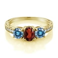thumbnail image 2 of Gem Stone King 18K Yellow Gold Plated Silver 3-Stone Ring Oval Red Garnet and Vivid Persian Blue Moissanite (1.99 Cttw, Size 9), 2 of 4