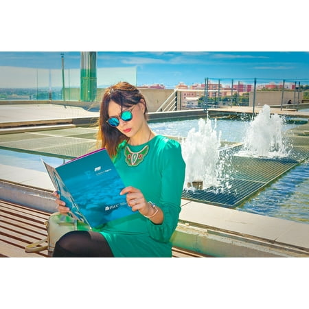 - LAMINATED POSTER Good Looking Women Pretty Woman Reading A Magazine Poster Print 24 x 36
