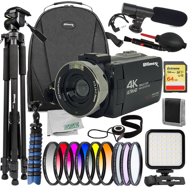 Ultimaxx Deluxe Amateur Digital Camcorder Bundle featuring a 2.7K resolution camcorder with 42.0MP image quality, 18x digital zoom, and advanced features like face recognition and anti-shake. The 26-piece bundle includes a 64GB Extreme Memory Card, mini condenser microphone, ultra-bright LED light kit, 60-inch tripod, mini 'Gripster' tripod, water-resistant gadget backpack, 3-piece protective filter kit, 6-piece gradual color filter kit, lithium-ion battery, USB-C cable, padded carry case, universal lens cap keeper, cleaning tools, and more. Ideal for amateur videographers and content creators.