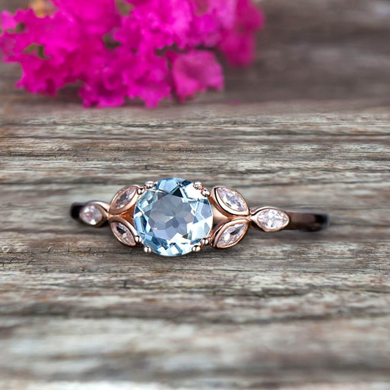 Rose gold ring on sale with aquamarine stone